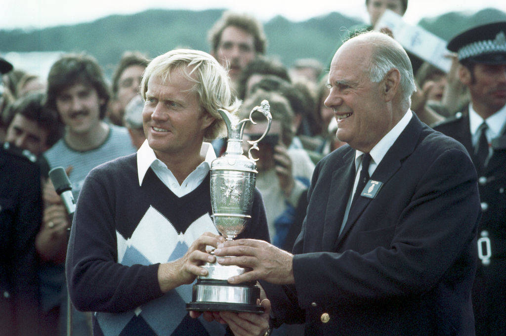 Jack Nicklaus (left) is presented with the Claret Jug after winning The Open in 1978